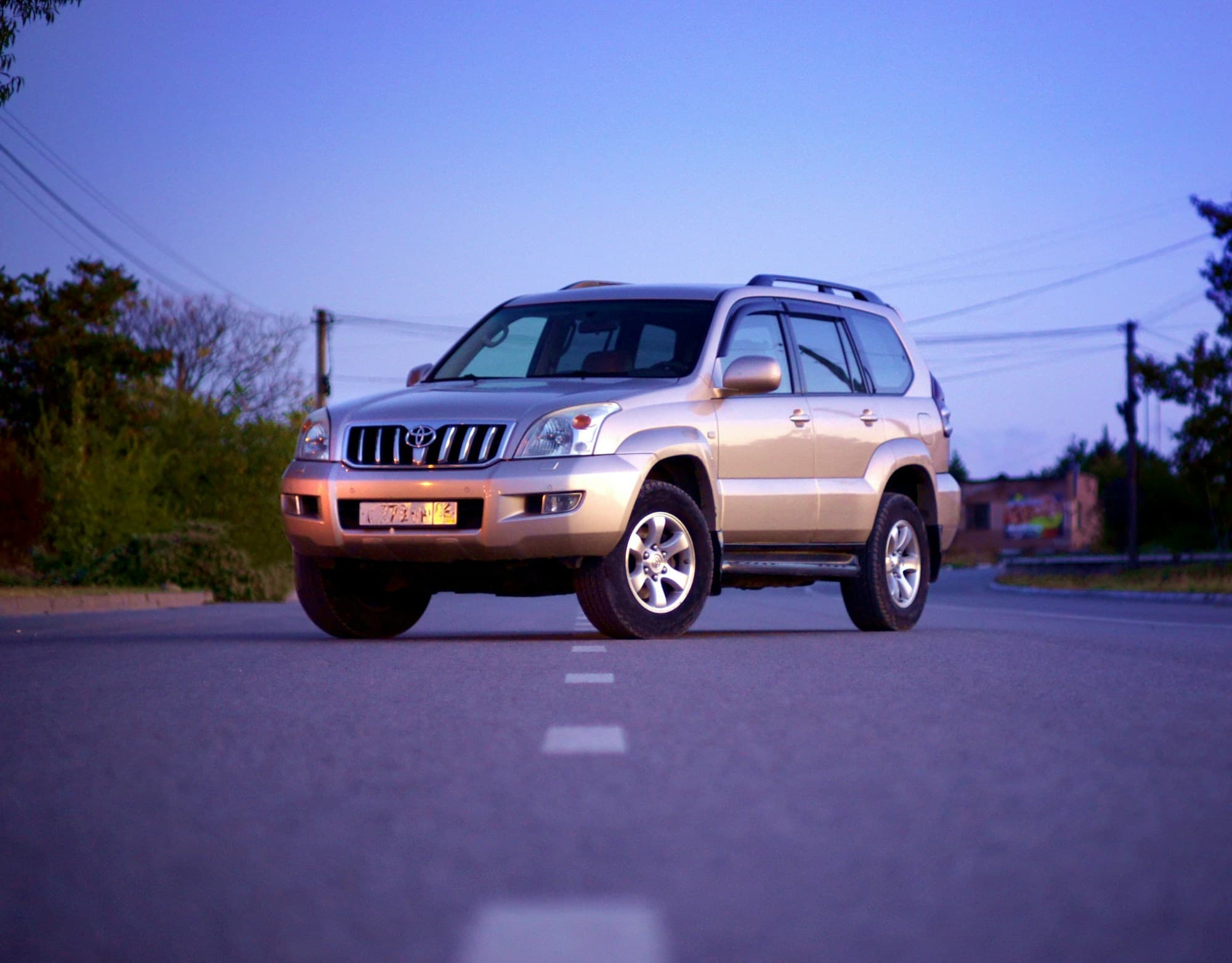 Toyota Land Cruiser Prado parked on a road